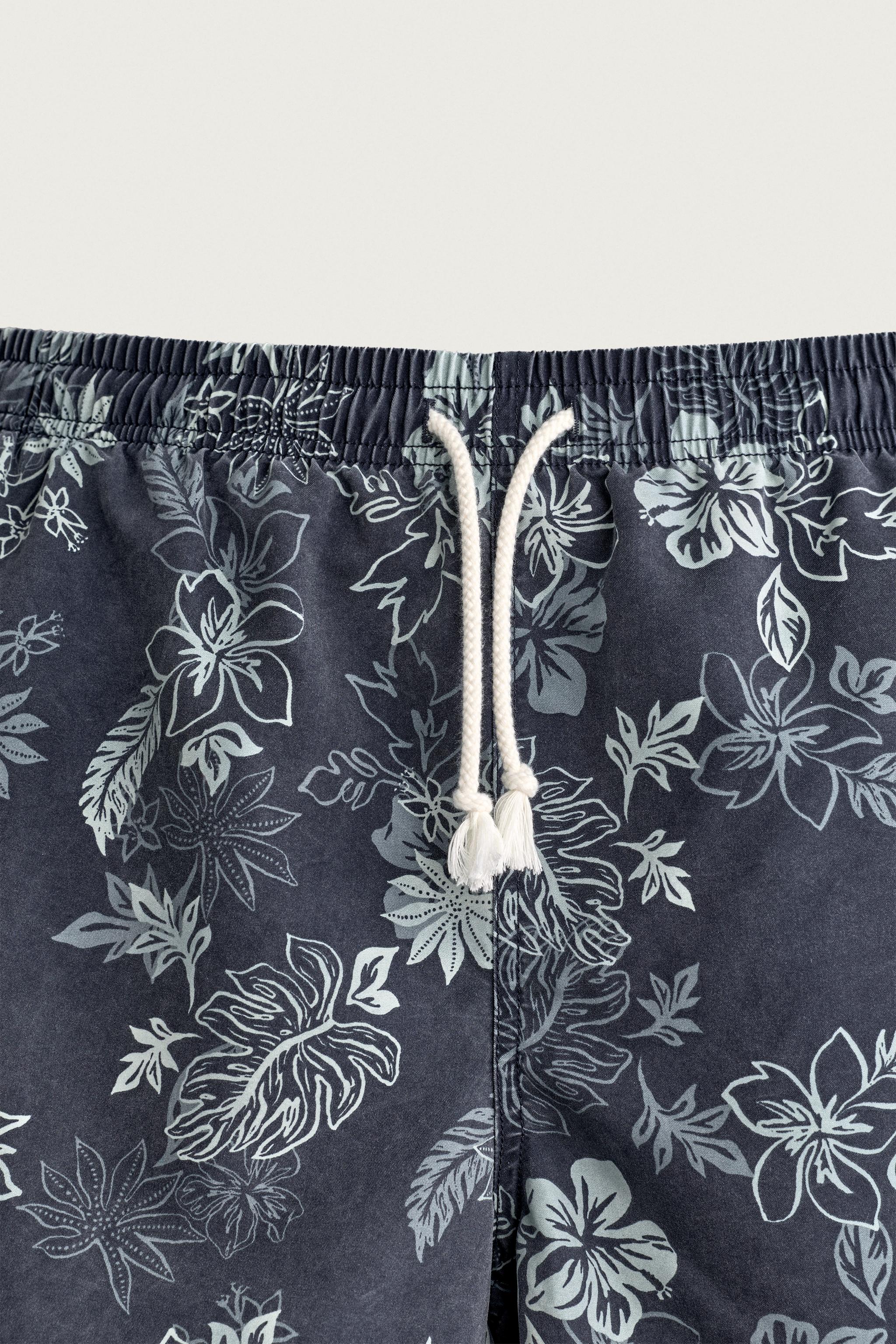 FLORAL PRINT LONGLINE SWIM SHORTS